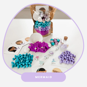 Mermaid sensory kit with ocean themed sensory filler and play pieces.